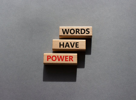 Words have power symbols. Wooden blocks with words Words have power. Beautiful gray background. Business and Words have power concept. copyspace.の写真素材