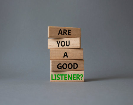 Listening skills symbol. Wooden blocks with words Beautiful gray background. Business and Are you a good Listener concept. copyspace.の写真素材