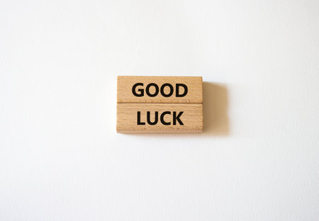 good luck symbol. Wooden blocks with words Good luck. Beautiful white background. Business and good luck concept. copyspace.の写真素材