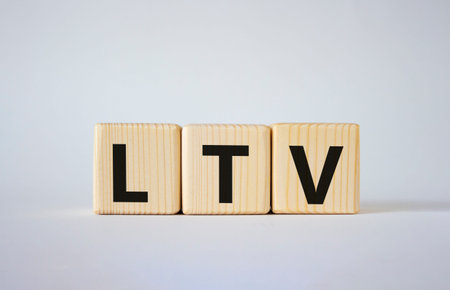 LTV - Life Time Value symbol. Concept word LTV on wooden cubes. Beautiful white background. Business...