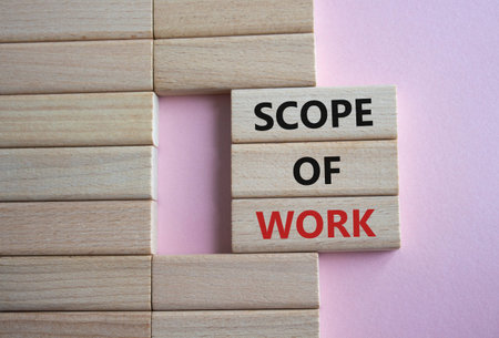 Scope of work symbol. Concept words Scope of Work on wooden blocks. beautiful pink background....