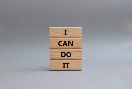 I can do it symbol. Concept words I can do it on wooden blocks. Beautiful gray background. Business and I can do it concept. Copy space.の写真素材