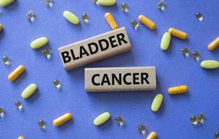 Bladder Cancer symbol. Concept word Bladder Cancer on wooden blocks. Beautiful purple background...