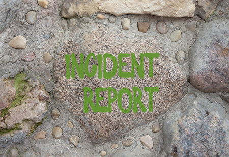 Incident Report symbol. Stone wall Incident Report on wooden blocks. Beautiful stone background. Business and Incident Report concept. Copy spaceの写真素材