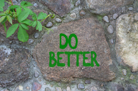Do better symbol. Stone wall with words Do better. Beautiful stone background. Business and Do better concept. Copy space.の写真素材
