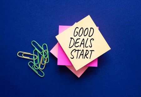 Good Deals Start symbol. Steaky Notes with words Good Deals Start. Beautiful deep blue background. Business and Good Deals Start concept. Copy space.の写真素材