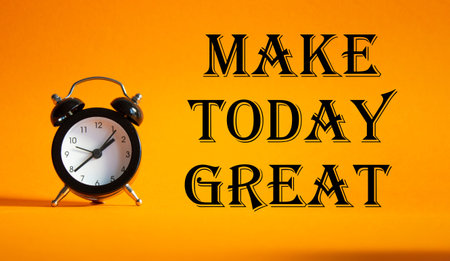 Make today Great symbol. Concept word Make today Great on Beautiful orange background with alarm clock. Business and Make today Great concept. Copy spaceの写真素材
