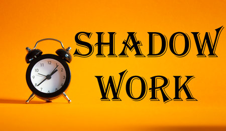 Shadow Work symbol. Concept words Shadow Work on Beautiful orange background with alarm clock. Business and Shadow Work concept. Copy space.の写真素材