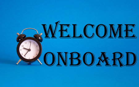 Welcome onboard symbol. Concept words Welcome onboard on Beautiful blue background with alarm clock. Business and Welcome onboard concept. Copy space.の写真素材