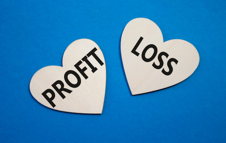 Pros vs Cons symbol. Concept word Pros vs Cons on wooden hearts. Beautiful blue background. Business...