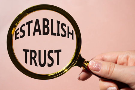Establish trust symbol. Magnifying Glass with Concept word Establish trust. Beautiful pink...