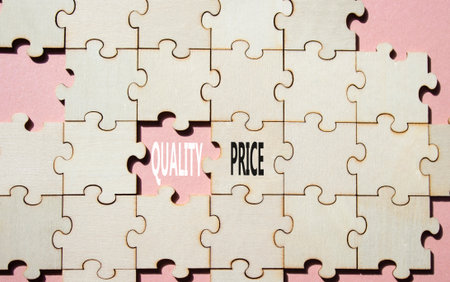 Price or Quality symbol. Concept word Price or Quality on wooden puzzle. Beautiful pink background. Business and Price or Quality concept. Copy spaceの写真素材