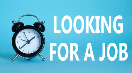 Looking for a job symbol. Beautiful blue background with alarm clock. Business and Looking for a job...