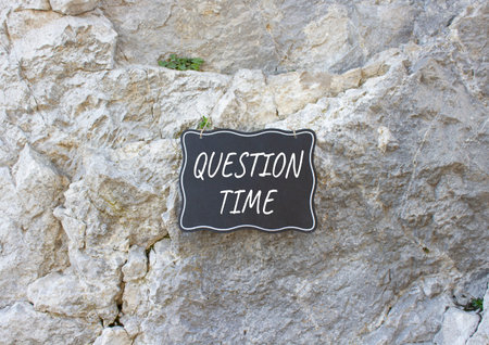 Question Time symbol. Stone wall with words Question Time. Beautiful stone background. Business and...