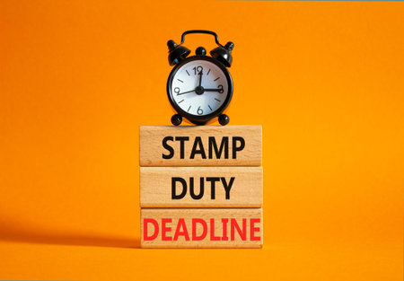 Stamp Duty Deadline symbol. Concept words Stamp Duty Deadline on wooden blocks. Beautiful orange...