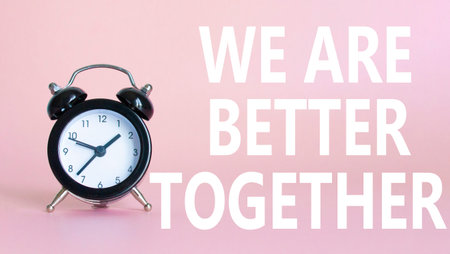 Tell us your story symbol. Beautiful pink background with alarm clock with words Tell us your story....