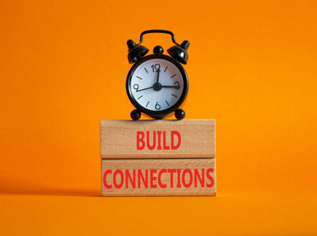 Build Connections symbol. Concept word Build Connections on wooden blocks. Beautiful orange...