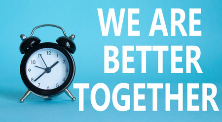 Tell us your story symbol. Beautiful blue background with alarm clock with words Tell us your story....