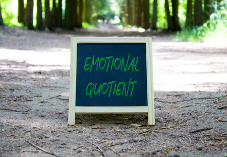 Emotional Quotient symbol. Concept word Emotional Quotient on chalk blackboard. Beautiful forest background. Business and Thank you concept. Copy space.の写真素材