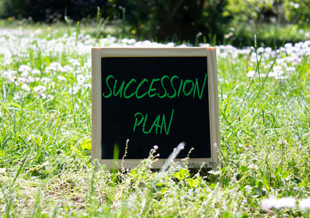 Succession Plan symbol. Concept word Succession Plan on blackboard. Beautiful forest background. Business and Succession Plan concept. Copy space.の写真素材
