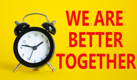 Beautiful yellow background with alarm clock. Copy space.の写真素材