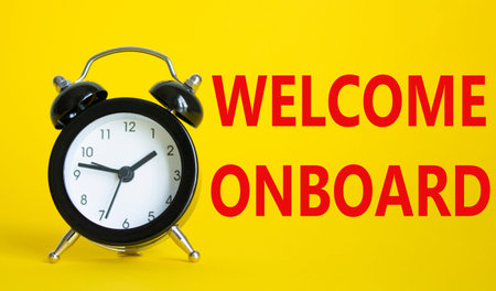 Welcome onboard symbol. Concept words Welcome onboard on Beautiful yellow background with alarm...