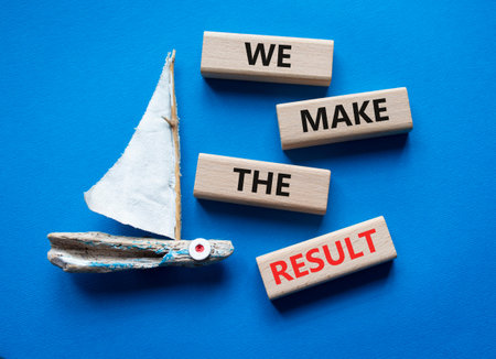 We make the result symbol. Concept words We make the result on wooden blocks. Beautiful blue...