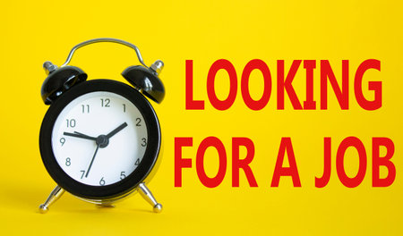 Looking for a job symbol. Beautiful yellow background with alarm clock. Business and Looking for a...