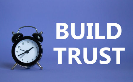 Build trust symbol. Beautiful purple background with alarm clock. Business and Build trust concept. Copy space.の写真素材