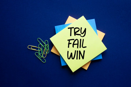 Try Fail Win symbol. Sticky notes with words Try Fail Win. Beautiful deep blue background. Business and Try Fail Win concept. Copy space.の写真素材