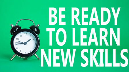Learn new skills symbol. Beautiful green background with alarm clock. Business and Learn new skills...