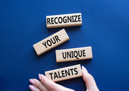 Unique Talents symbol. Concept words Recognize Your Unique Talents on wooden blocks. Beautiful deep...