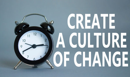 Create a culture of Change symbol. Beautiful gray background with alarm clock. Business and Create a...