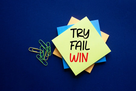 Try Fail Win symbol. Sticky notes with words Try Fail Win. Beautiful deep blue background. Business...