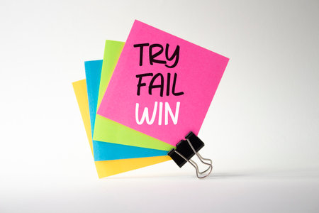Try Fail Win symbol. Sticky notes with words Try Fail Win. Beautiful white background. Business and Try Fail Win concept. Copy space.の写真素材