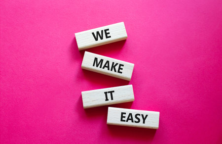 Concept words on wooden blocks. Beautiful bright red background. Business and concept. Copy space.の写真素材