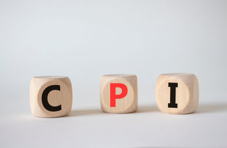 CPI - Consumer Price Index symbol. Concept word CPI on wooden cubes. Beautiful white background. Business and CPI concept. Copy space.の写真素材