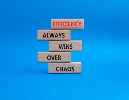 Efficiency symbol. Wooden blocks with words Efficiency Always Wins Over Chaos. Beautiful blue...
