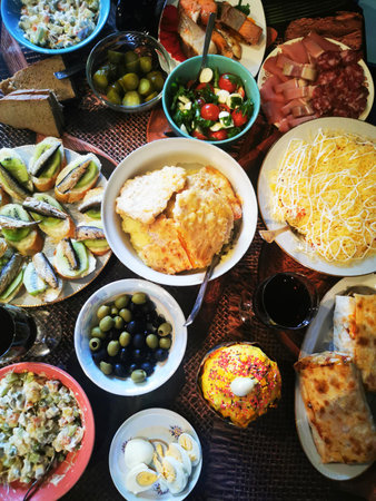 Easter table with traditional dishes and kulich. This image reflects celebration, culture and...