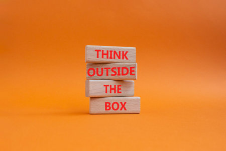 Wooden blocks with words. Beautiful orange background. Business and concept. Copy space