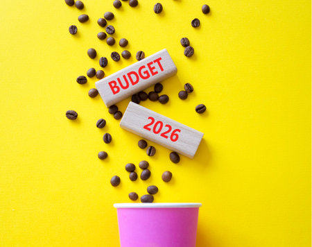 Budget 2026 symbol. Concept words Budget 2026 on beautiful wooden picture frame. Beautiful yellow...