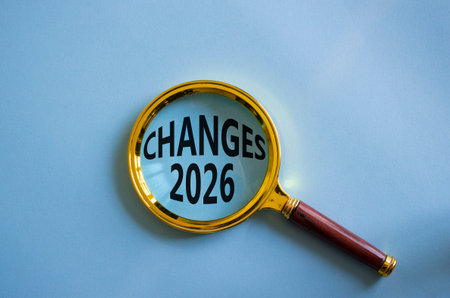 Changes 2026 symbol. Magnifying Glass with words Changes 2026. Beautiful blue background. Business...