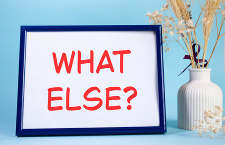 What else symbol. Concept words What else on beautiful wooden picture frame. Beautiful light blue...