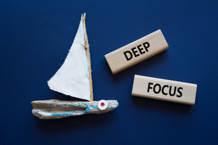 Concept word on wooden blocks. Beautiful deep blue background with boat. Business and concept. Copy...