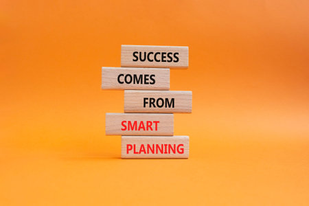 Smart Planning symbol. Wooden blocks with words Success Comes From Smart Planning. Beautiful orange...