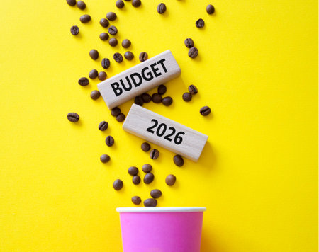 Budget 2026 symbol. Concept words Budget 2026 on beautiful wooden picture frame. Beautiful yellow...