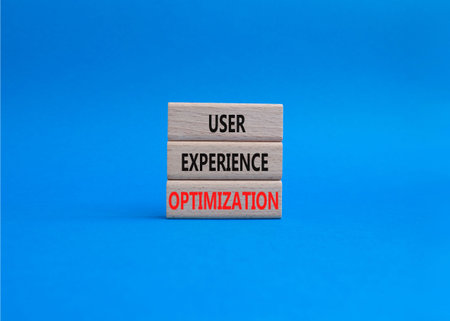 User Experience Optimization symbol. Concept word User Experience Optimization on wooden blocks....