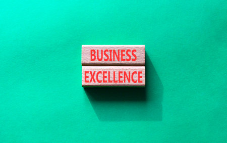 Business excellence symbol. Concept word Business excellence on wooden blocks. Beautiful green background. Business and Business excellence concept. Copy space