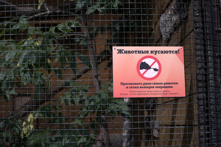Information board in Russian about the danger of bites by birds in the Zooのeditorial素材