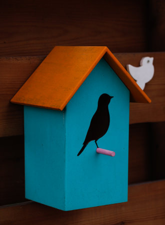 Wooden decoration, craft idea - bird houseの写真素材